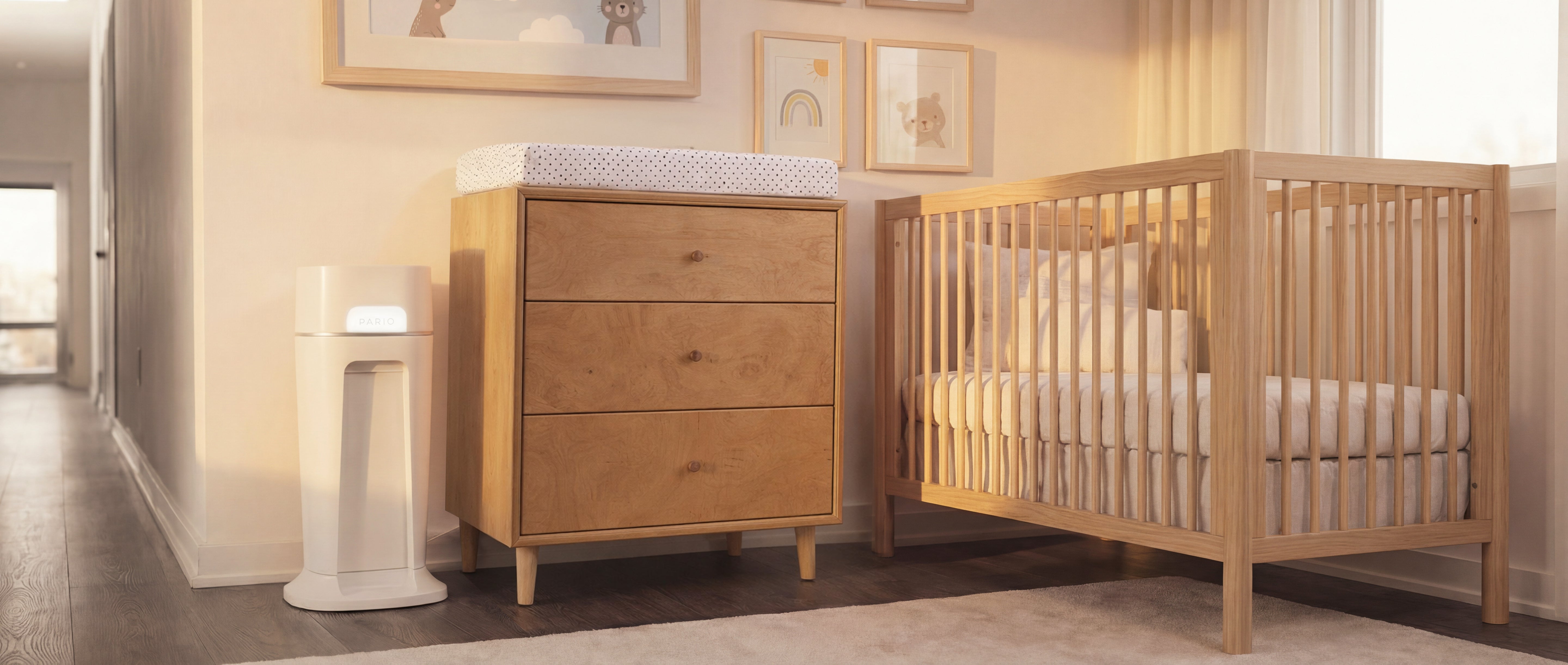 Nursery with wooden crib and dresser in a well-lit room. DiaperSealer in the background.